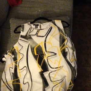 This is a sleeveless Alfani Top.